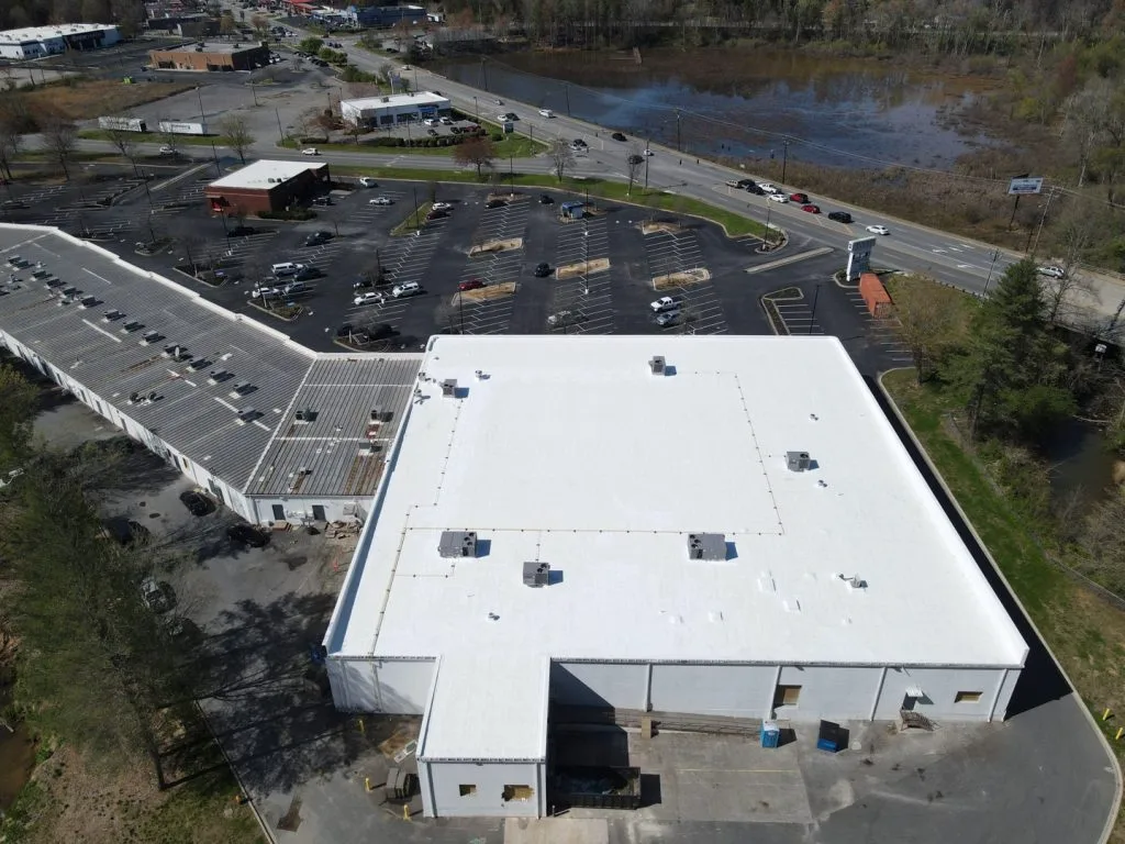 commercial roof before and after a membrane restoration project