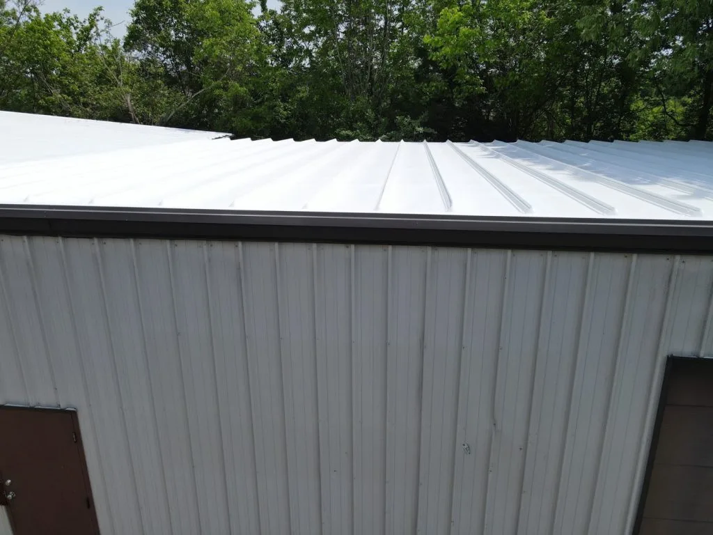 commercial building featuring a white R-panel metal roof