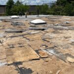 tear-out phase of a commercial roofing project