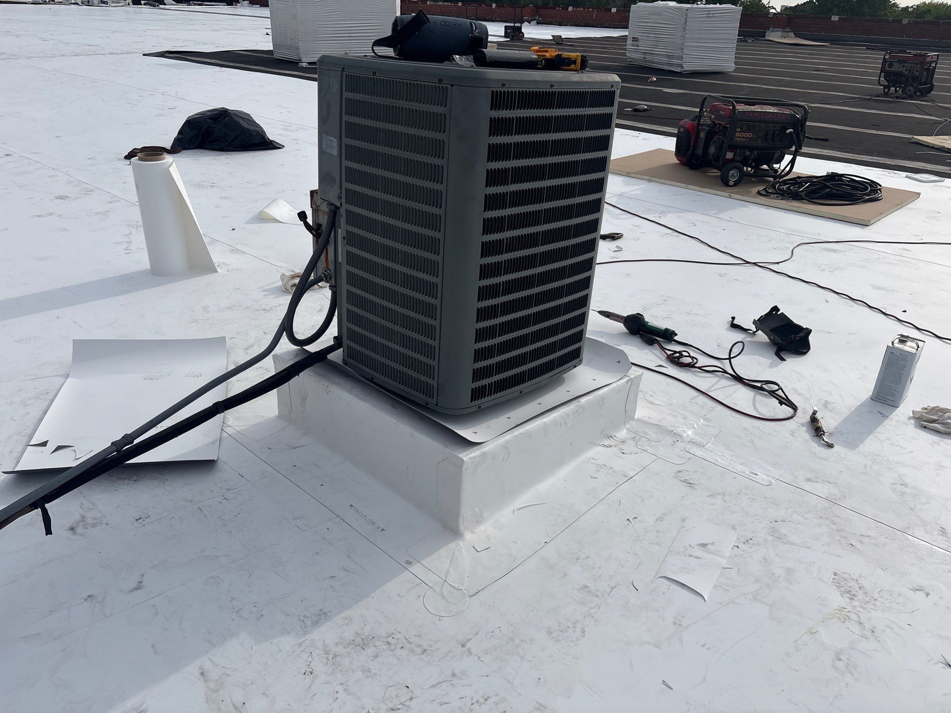AC unit reinstalled on new curb detail