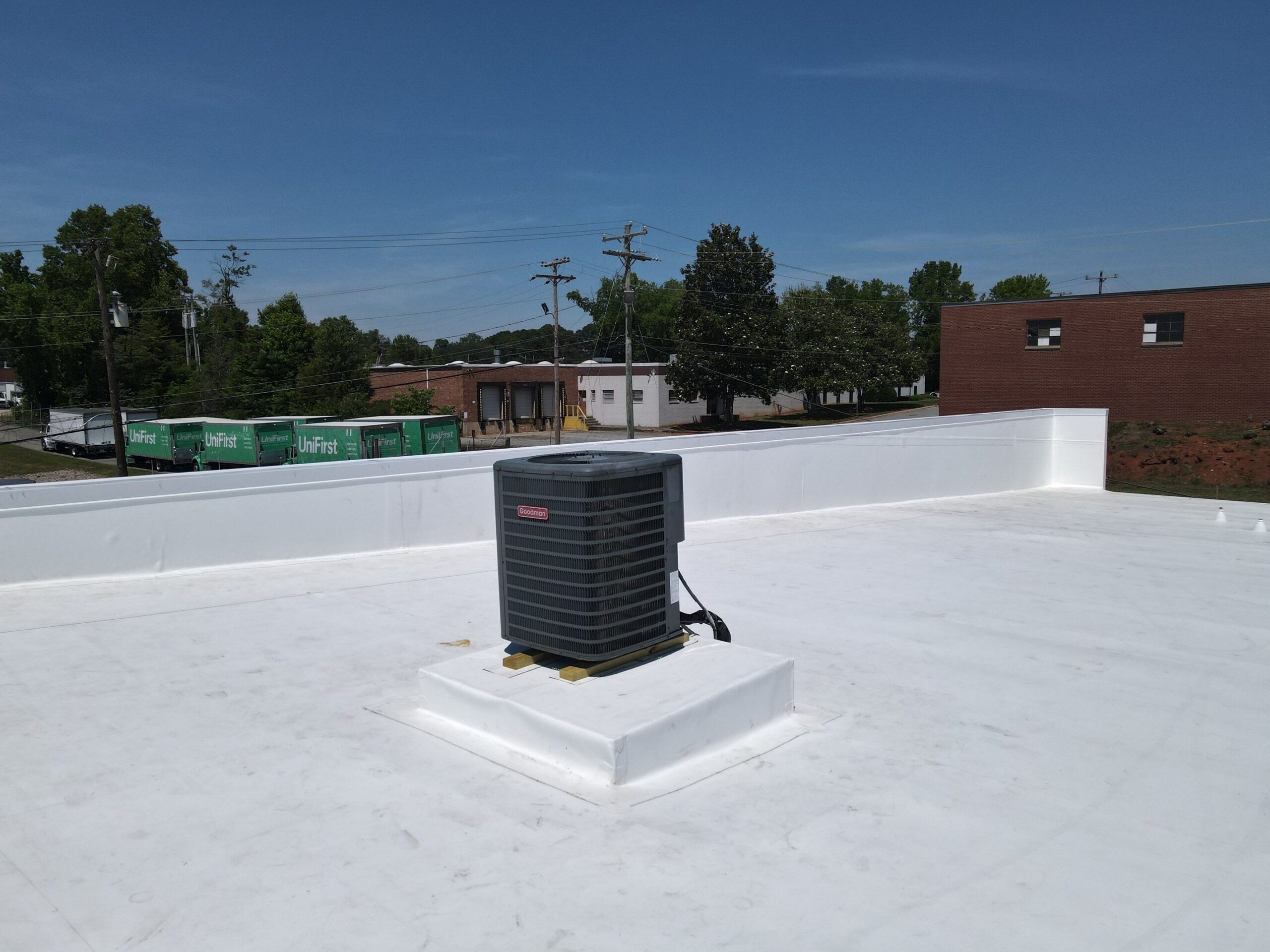 AC curb detail and parapet wall after completion