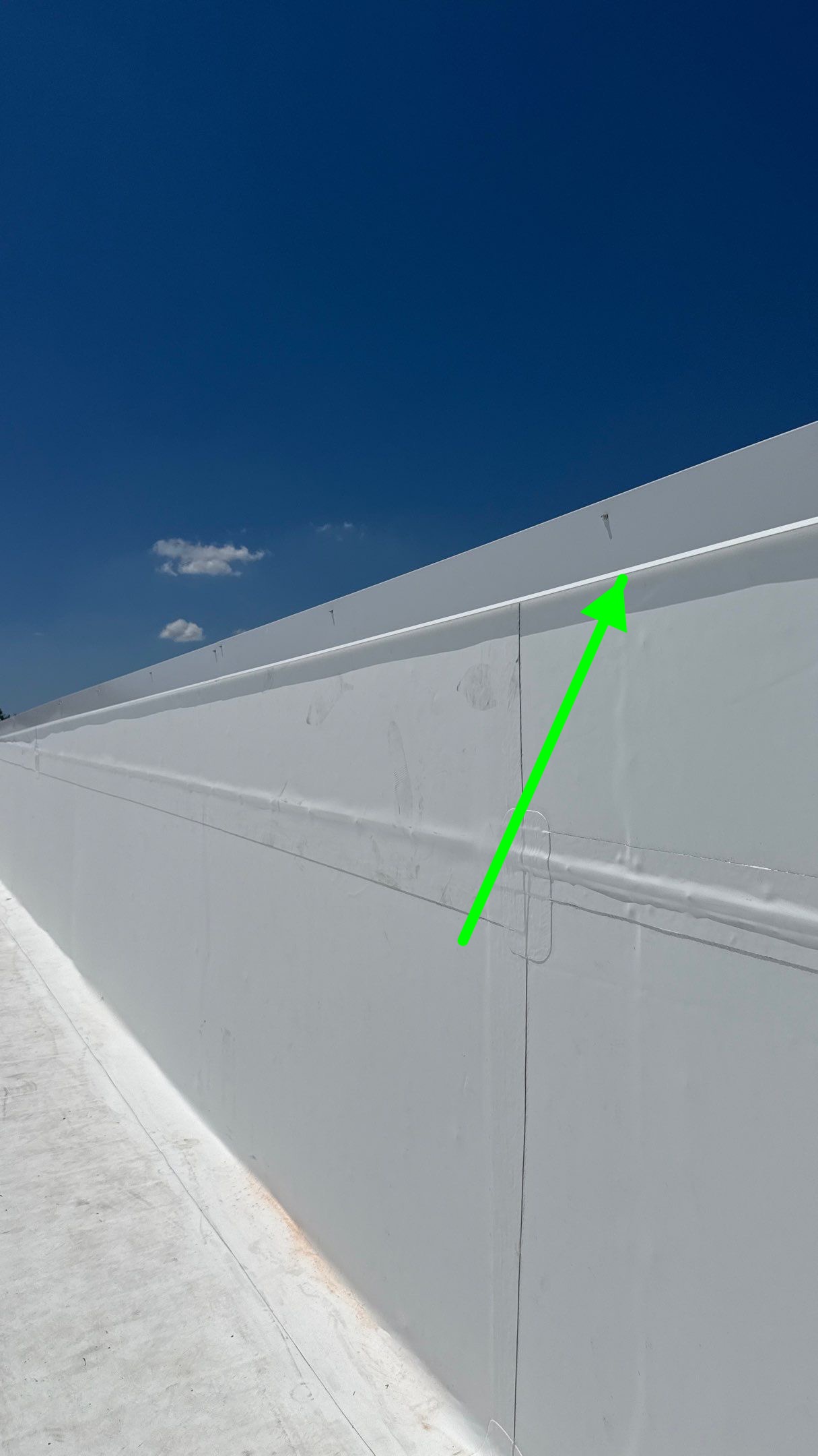 New metal wall coping protecting parapet