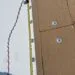 Technician performing commercial roofing on a commercial roof in High Point, NC