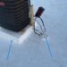 Technician performing tpo roofing on a commercial roof in High Point, NC