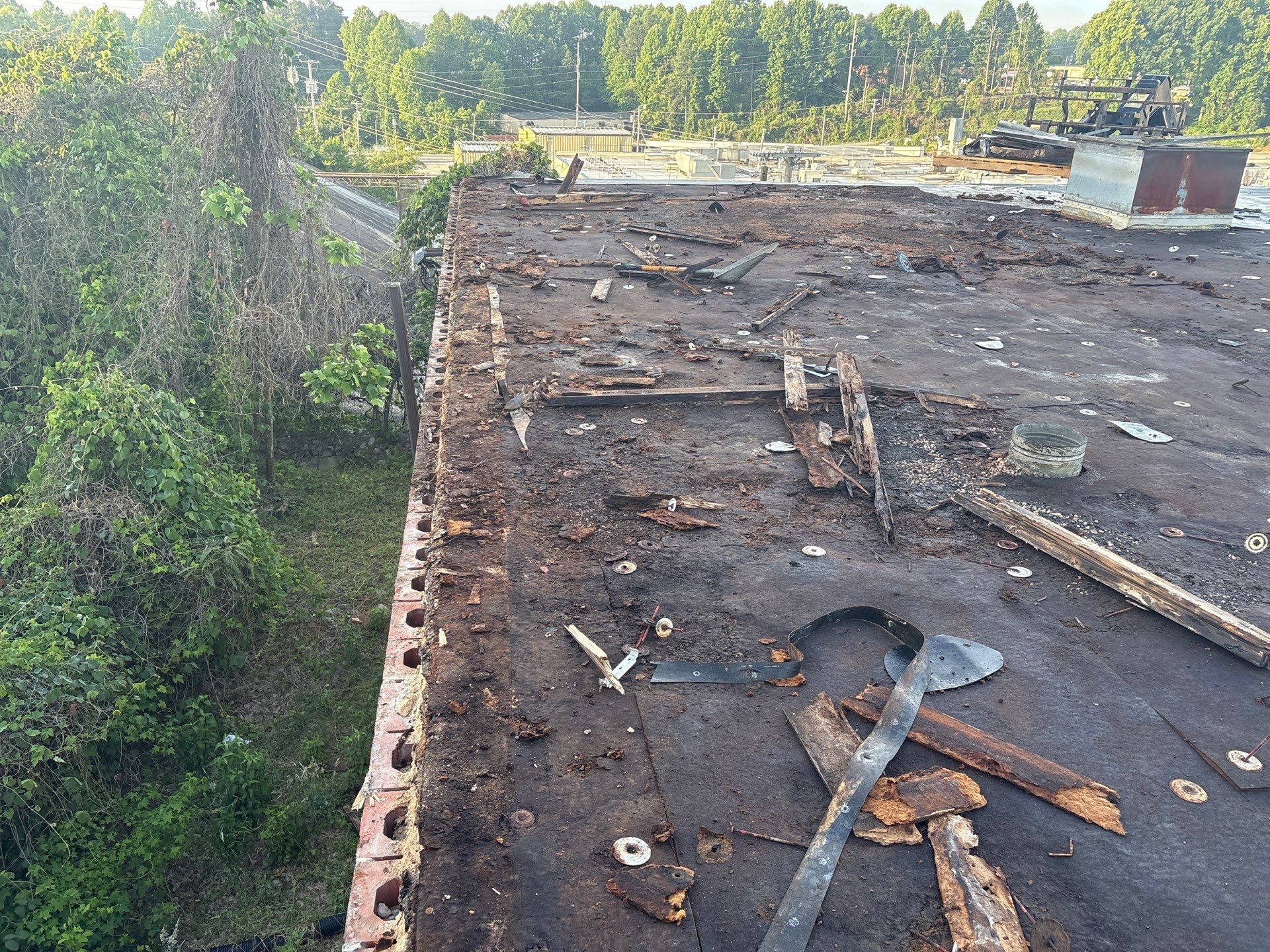 Technician performing tpo roofing on a commercial roof in High Point, NC