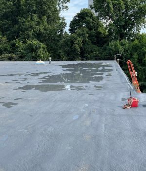 commercial flat roof undergoing a coating or restoration process