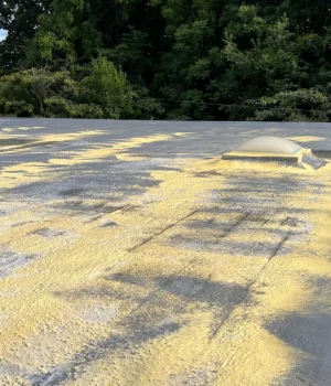 commercial roof featuring a spray polyurethane foam