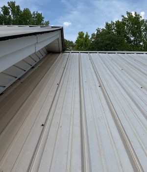 Technician performing commercial roofing on a commercial roof in Denton, NC